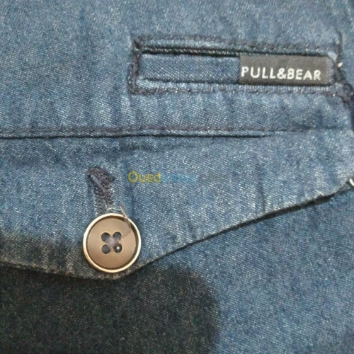 Short homme original marque "Pull and Bear" taille 42