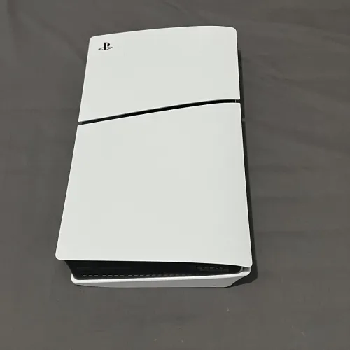 PlayStation 5 + 2 Manettes + 3 jeux