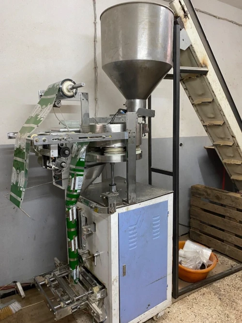 Machine de remplissage et d'emballage