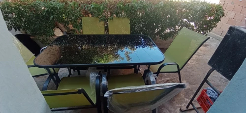 Table importation en verre trempé+ 6 chaises 