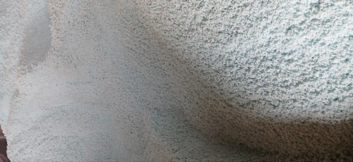 Billes de polystyrène enrobé pour allègement du béton ou mortier 