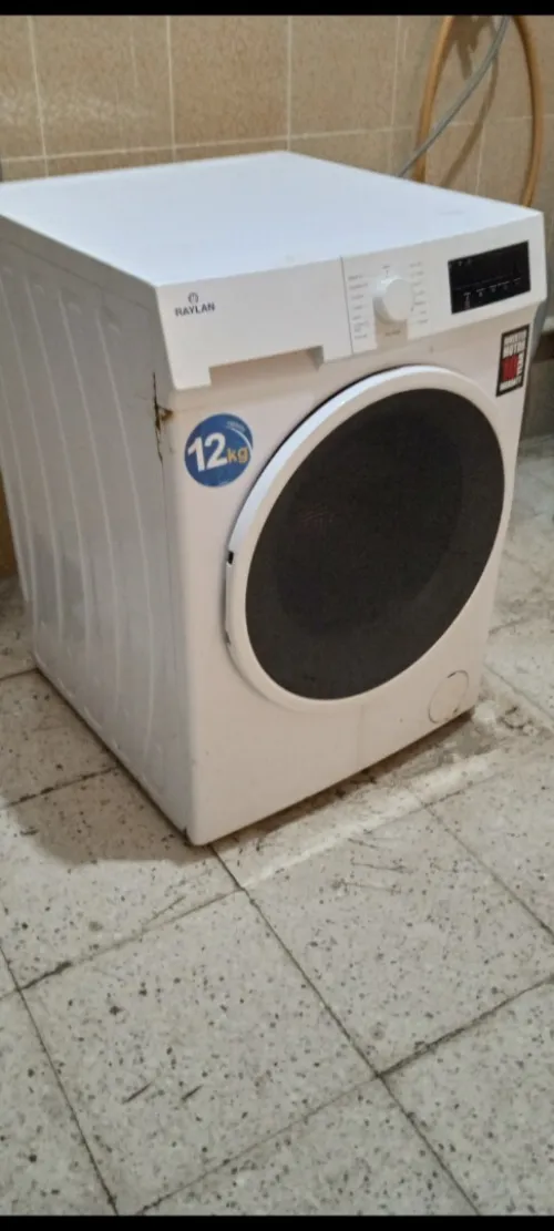 Vente de machine à laver Raylan 12kg en panne. Problème de carte mère du moteur.