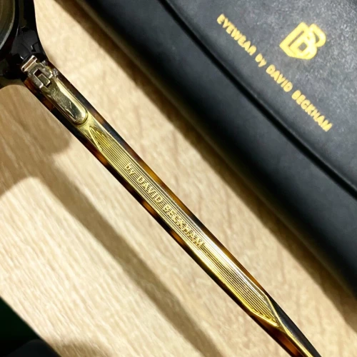 Lunettes David Beckham originales avec clip solaire  Excellent état