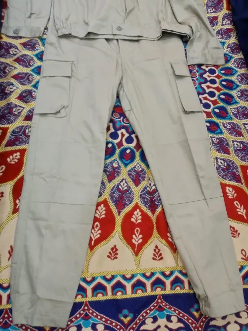 بن طلحة براقي tenu