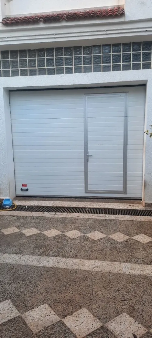 Porte Sectionel rideaux métallique