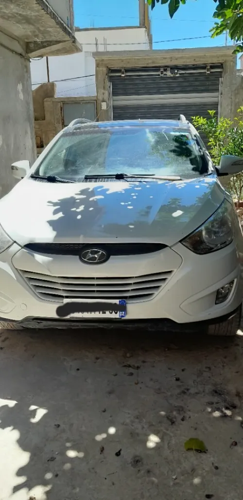 Tucson blanche Hyandai 2012 Toute