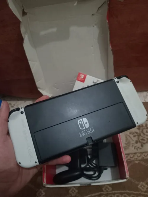 Nintendo switch Oled cartona flache + 35 jeux