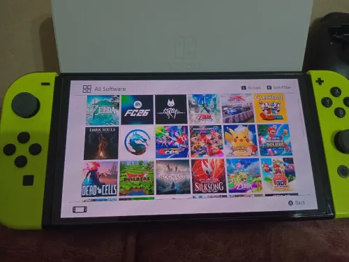 Nintendo switch oled état neuf +40 jeux
