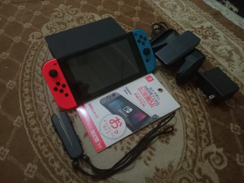 Nintendo switch flache 10/10 + 35 jeux