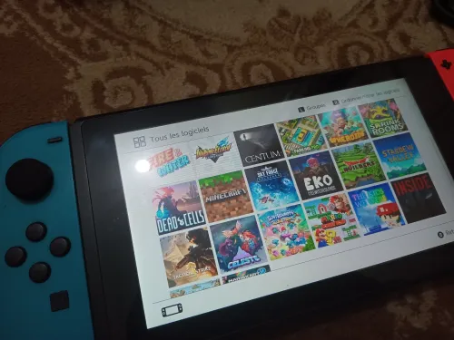 Nintendo switch flache puce +35 jeux
