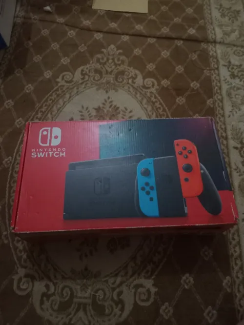 Nintendo switch V2 flache 10/10 cartona +35 jeux
