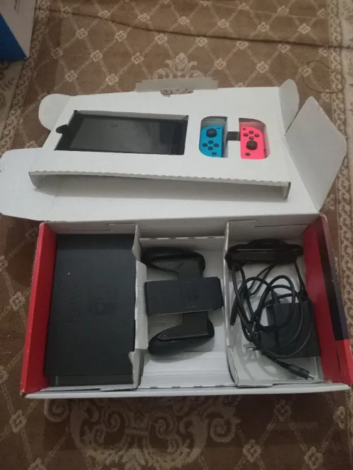 Nintendo switch V2 flache 10/10 cartona +35 jeux
