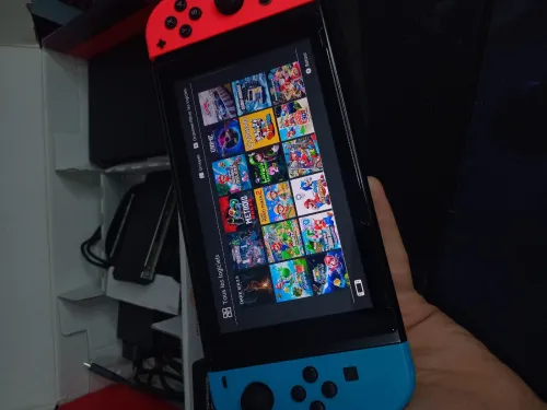Nintendo switch V2 flache état neuf +40 jeux