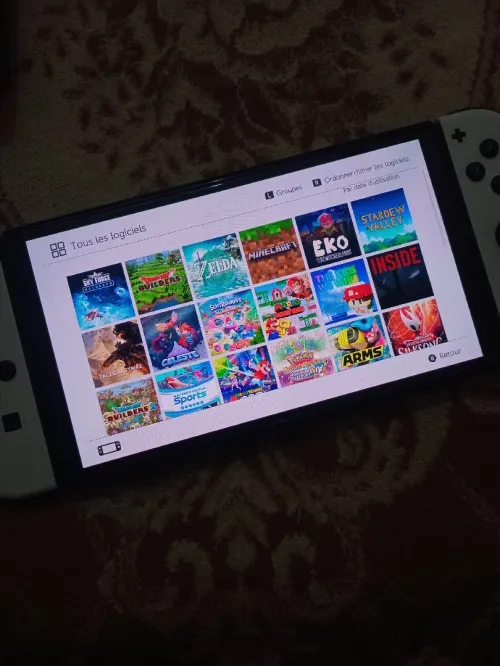 Nintendo switch oled flache + chargeur neuf + 35 jeux