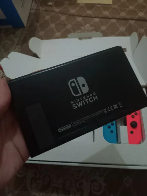 Nintendo switch V2 flache 10/10 cartona +35 jeux
