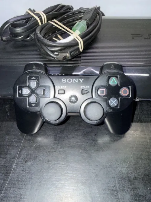 Ps3 super slim 500GB flasher etat 10/10 pleins de jeux avec tout les accesoires
