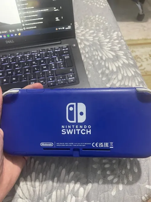 Nintendo switch lite flashé 128gb pleins de jeux