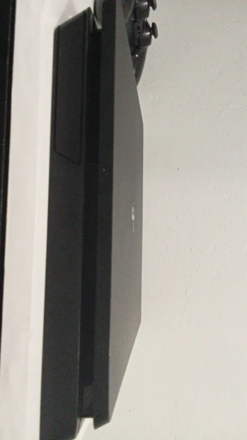 Playstation 4 slim 1TB + 1 manette sans fil original