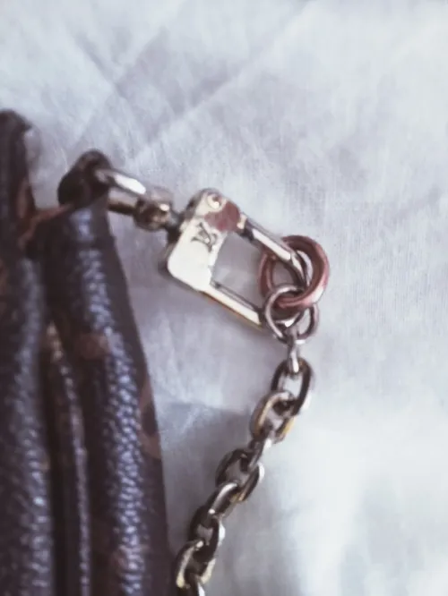 Petite pochette vintage de marque en cuir