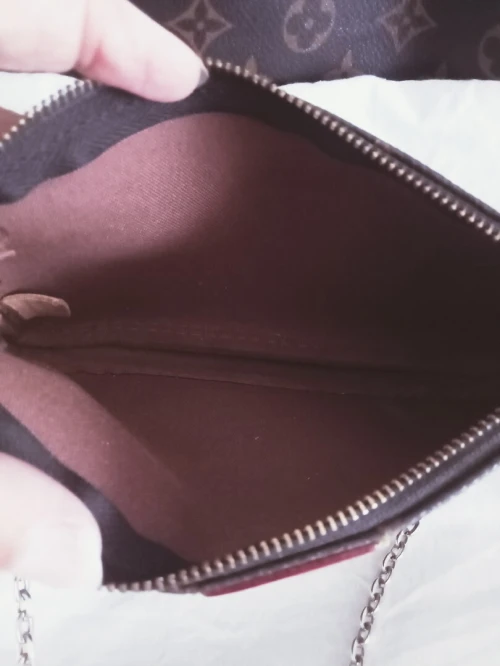 Petite pochette vintage de marque en cuir
