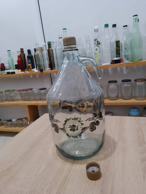 Bouteille en verre  قارورات زجاجية