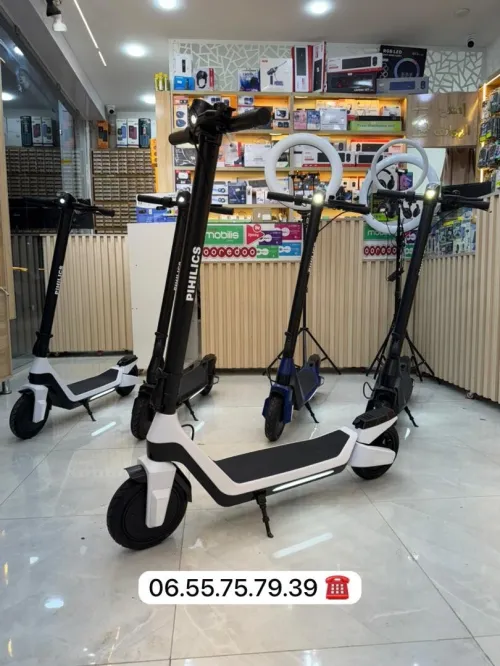 trotinette electrique pihilics تروتينات الكتريك مدال جديد برموسيو جديد كرطونا سكوتر 