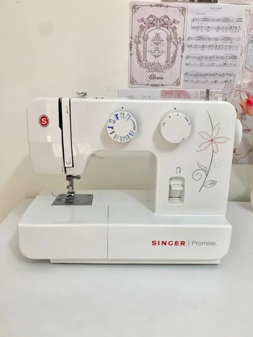 Machine à coudre singer promise 1412
