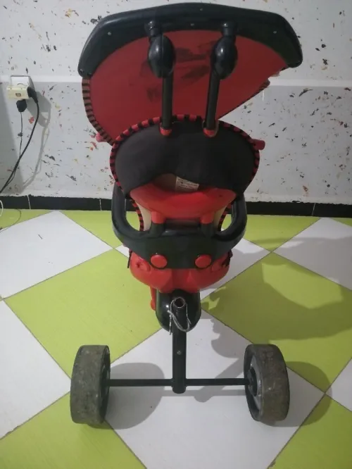 Vélo poussette tricycle