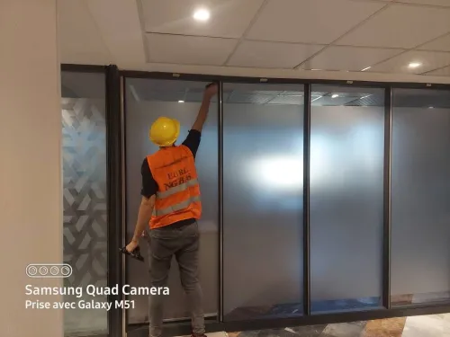 Travaux de cloison amovible mur rideau façade ventilée