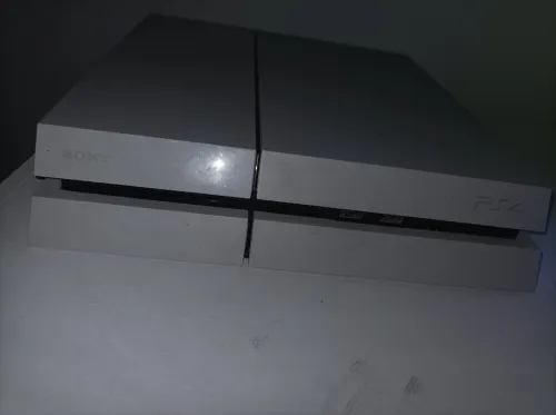 ps4 online bon état avec 2 manette et 4 jeux