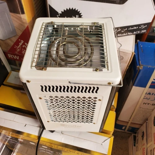 مدفأة + موقد طهي من الأعلى 2في1 . REVOLTEC 2000W