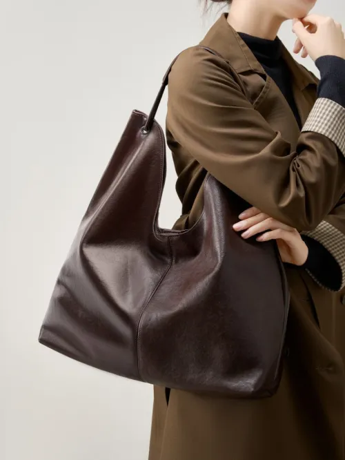 Sac tote en cuir végétal tendance 2026 grande capacité chic polyvalent à porter sur lépaule ou sous le bras pour les cours et le travail