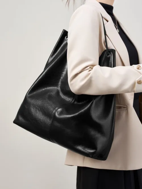 Sac tote en cuir végétal tendance 2026 grande capacité chic polyvalent à porter sur lépaule ou sous le bras pour les cours et le travail
