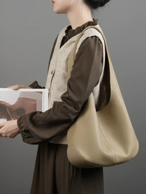 Sac seau tote en cuir de vache pleine fleur grande capacité nouveau modèle tendance coréen chic à porter sous le bras ou sur l épaule