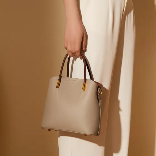 Sac seau en cuir de vache véritable pour femme printemps été 2025 look de niche polyvalent chic à main et bandoulière décontracté