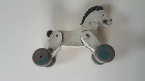  Vintage cheval en bois rustique avec roues des années 50's 