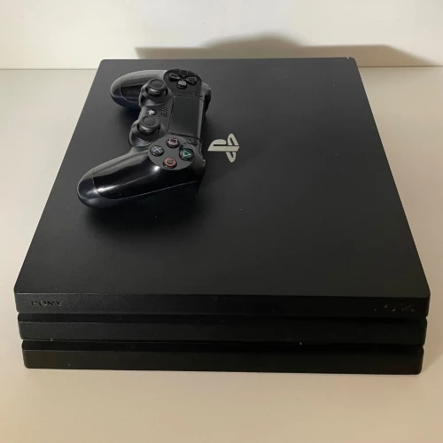 Ps4 Pro online 1T avec manette original en excellent état