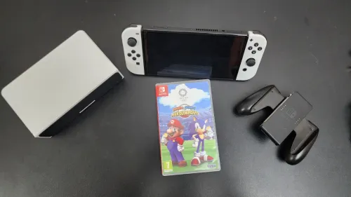 Nintendo switch OLED + Carte SD + Jeux Mario