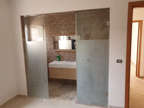Paroi de douche et façade en verre 