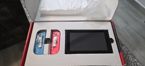 Nintendo switch avec 6 jeux et accessoires 