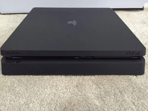 Ps4 500gb sans manette 9/10 avec tecku de garont 