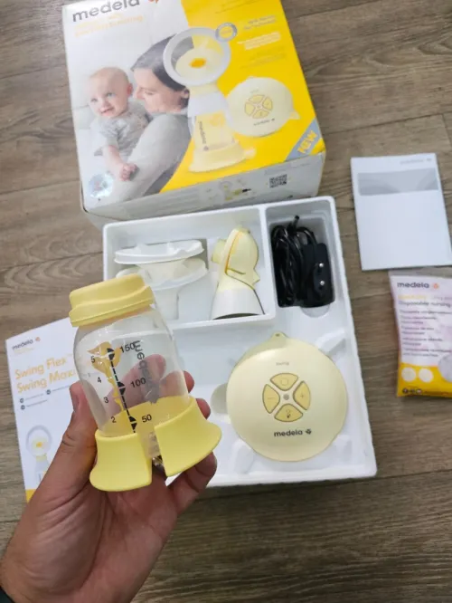 Tire lait Medela Swing Flex avec 02 teterelles 21mm et 24pp
