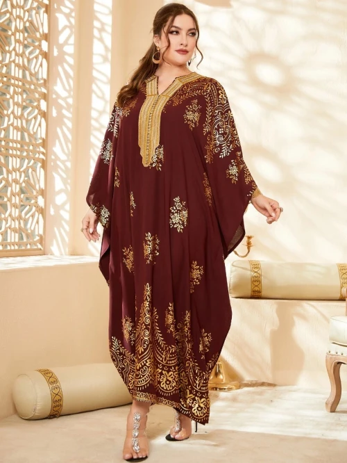 Robe Caftan volute or à imprimé manches chauve-souris