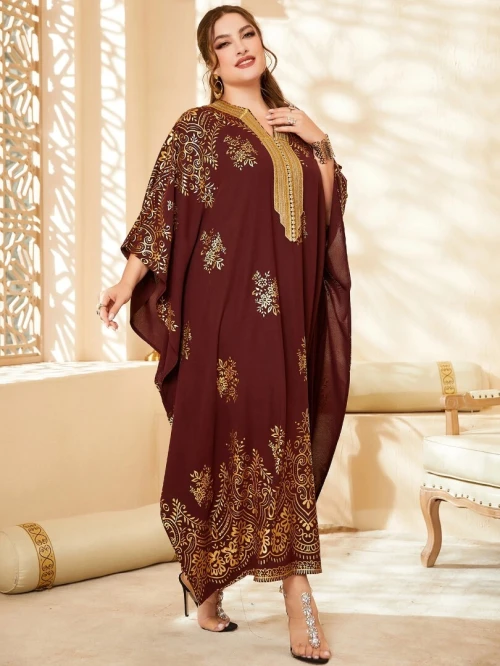 Robe Caftan volute or à imprimé manches chauve-souris