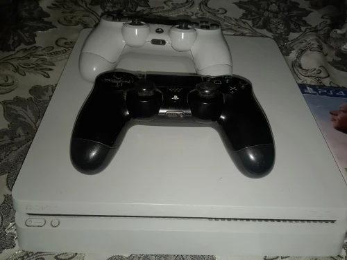 Ps4 sony +les manettes+les Cd