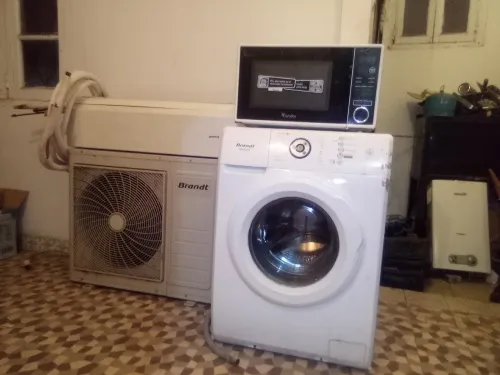 Machine a laver+ micro-ondes + climatiseur +Machina taa khiyata