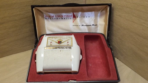 Rasoir électrique REMINGTON de luxe ROLL-A-MATIC des années 60's