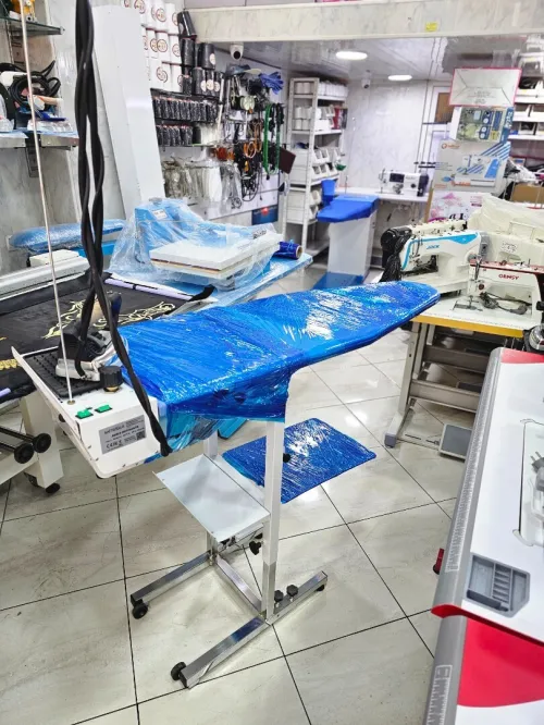 Table de repassage aspirante avec centrale a vapeur intégré طاولة حدادة مع شوديار