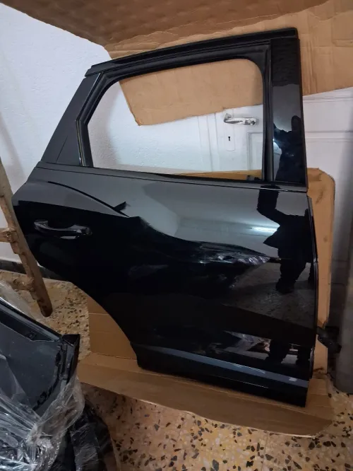 Capot. Pare-chocs. Porte. Aile. Malle noir couleur d'origine Audi Q3