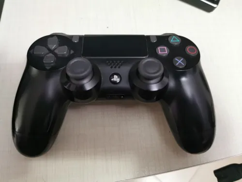 Ps4 slim 500gb avec 3 jeux Rdr +Gta5 +Nfs payback 